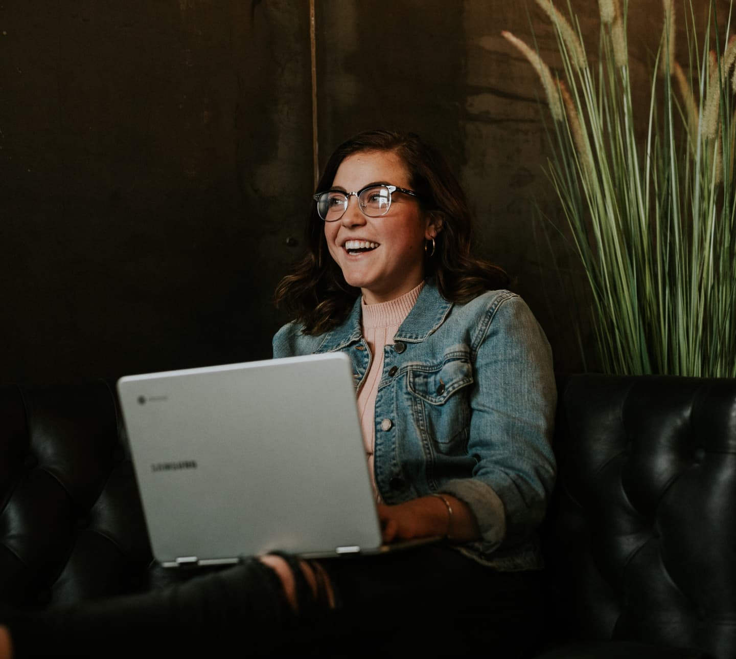 woman sitting with laptop